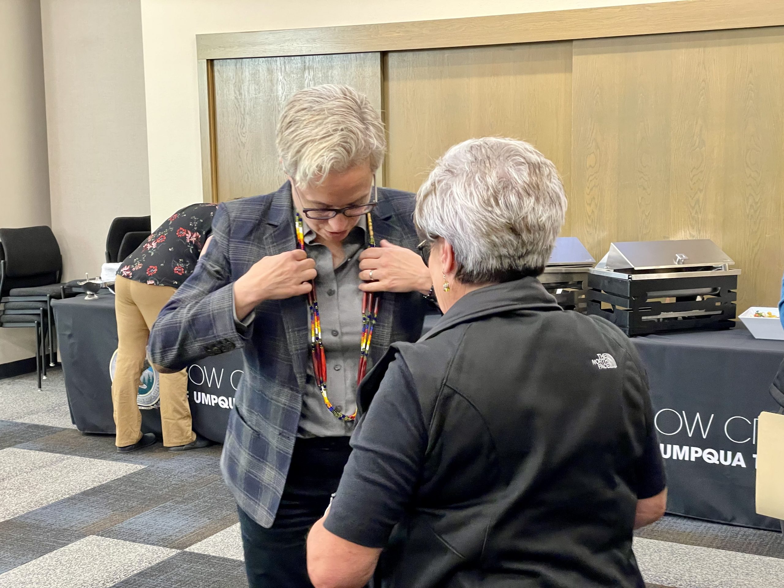 Governor Kotek receives a gifted necklace made by Chairman Carla Keene, Sept. 18, 2024. Cow Creek Band of Umpqua Tribe of Indians